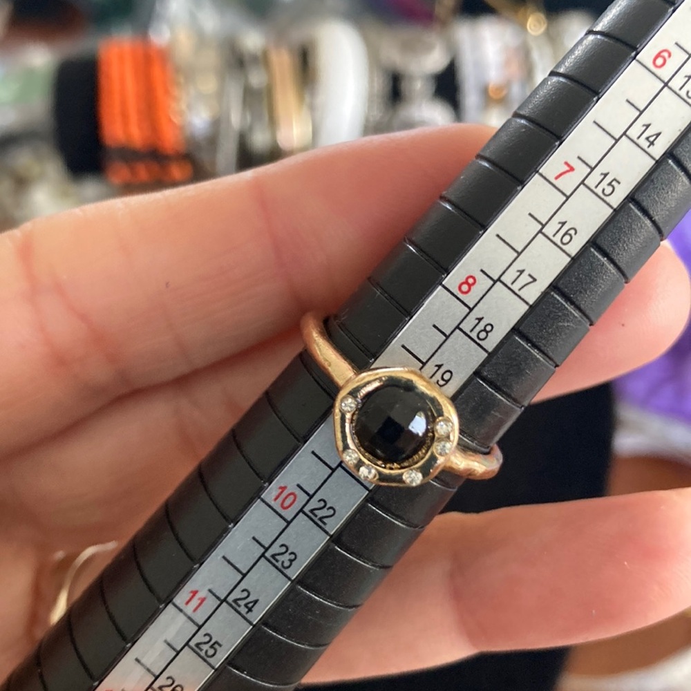 Gold and Black Spinner Ring with Modern Design